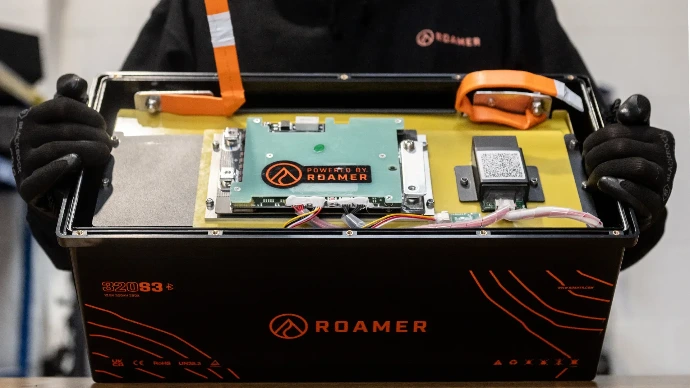 An open Roamer Batteries lithium battery